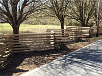 <b>Custom Battlefield Fence with Battlefield rail or snake rail which is split, not saw cut, for a true rustic appearance, and is pressure treated for longevity.</b>